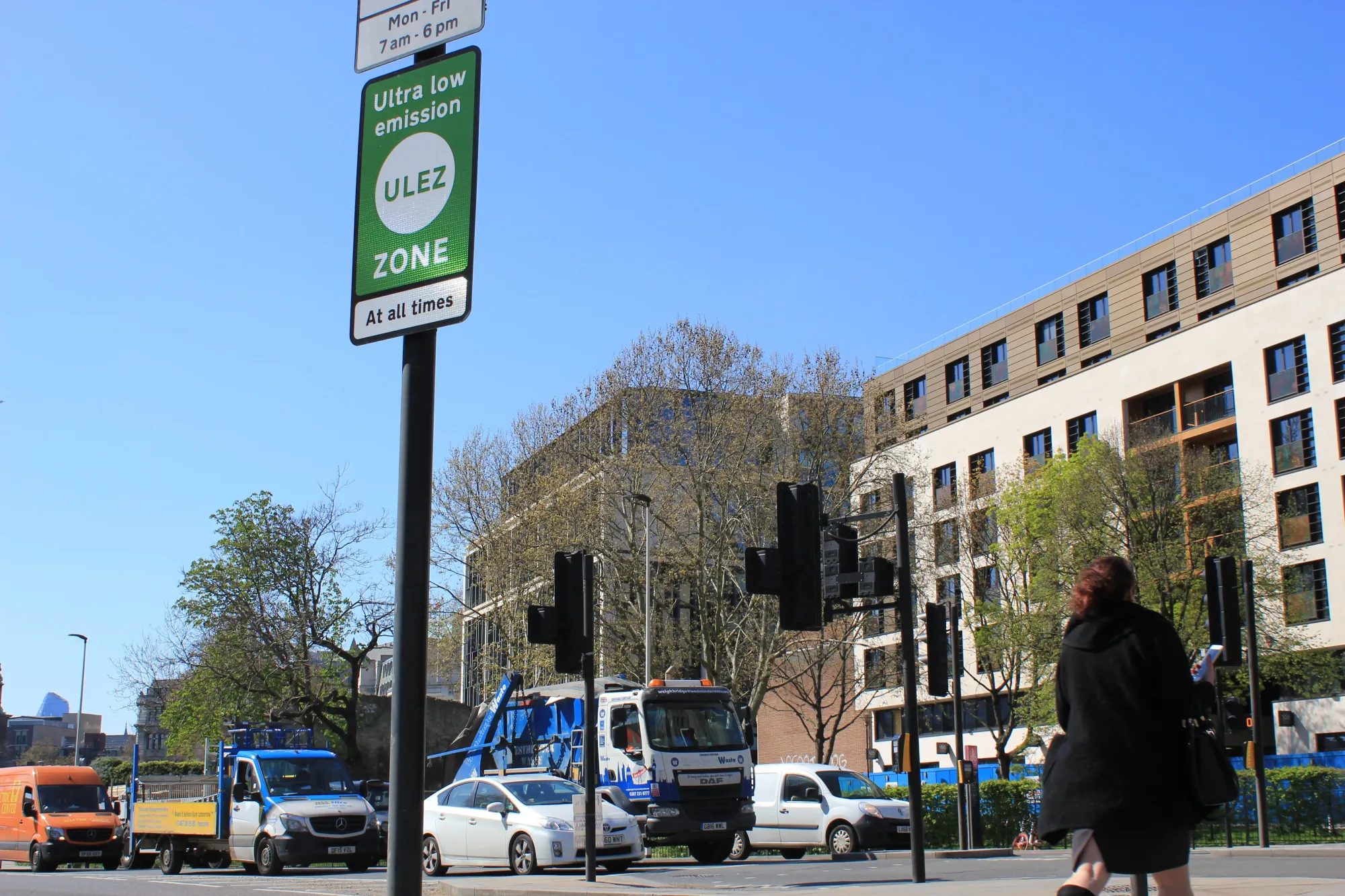 Ultra Low Emission Zone (ULEZ) sign in London streets.
